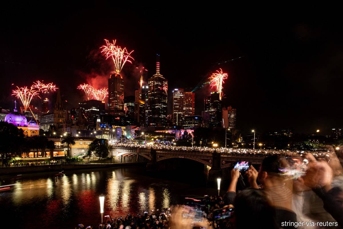 World starts welcoming New Year with fireworks, prayers and some stark words